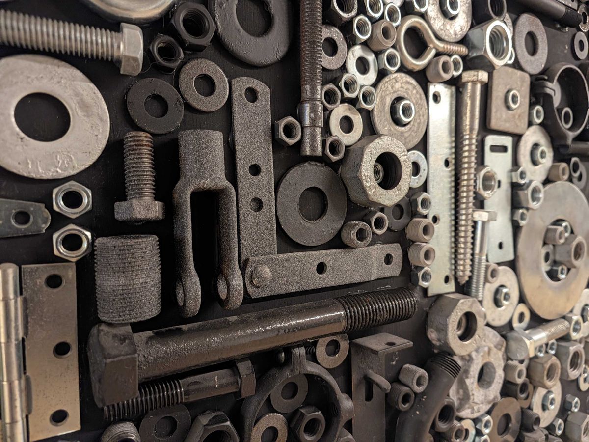 A wall of nuts and bolts